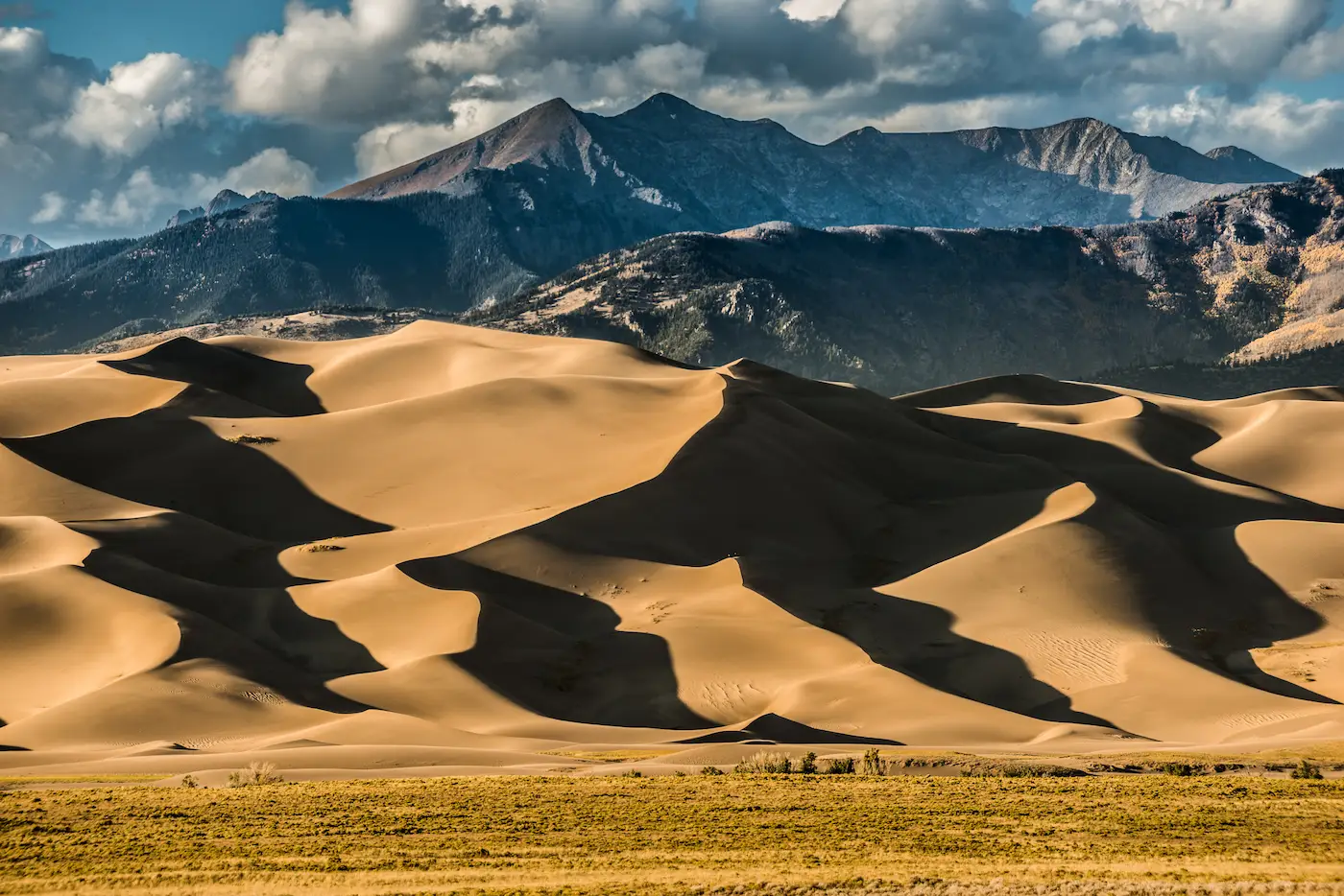 Great Sand Dunes National Park with sand dunes and mountains in the background